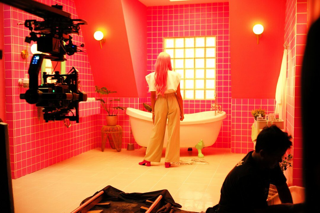 Modern television studio interior with desk and broadcast lights